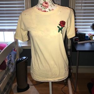Pale yellow distressed tee with rose